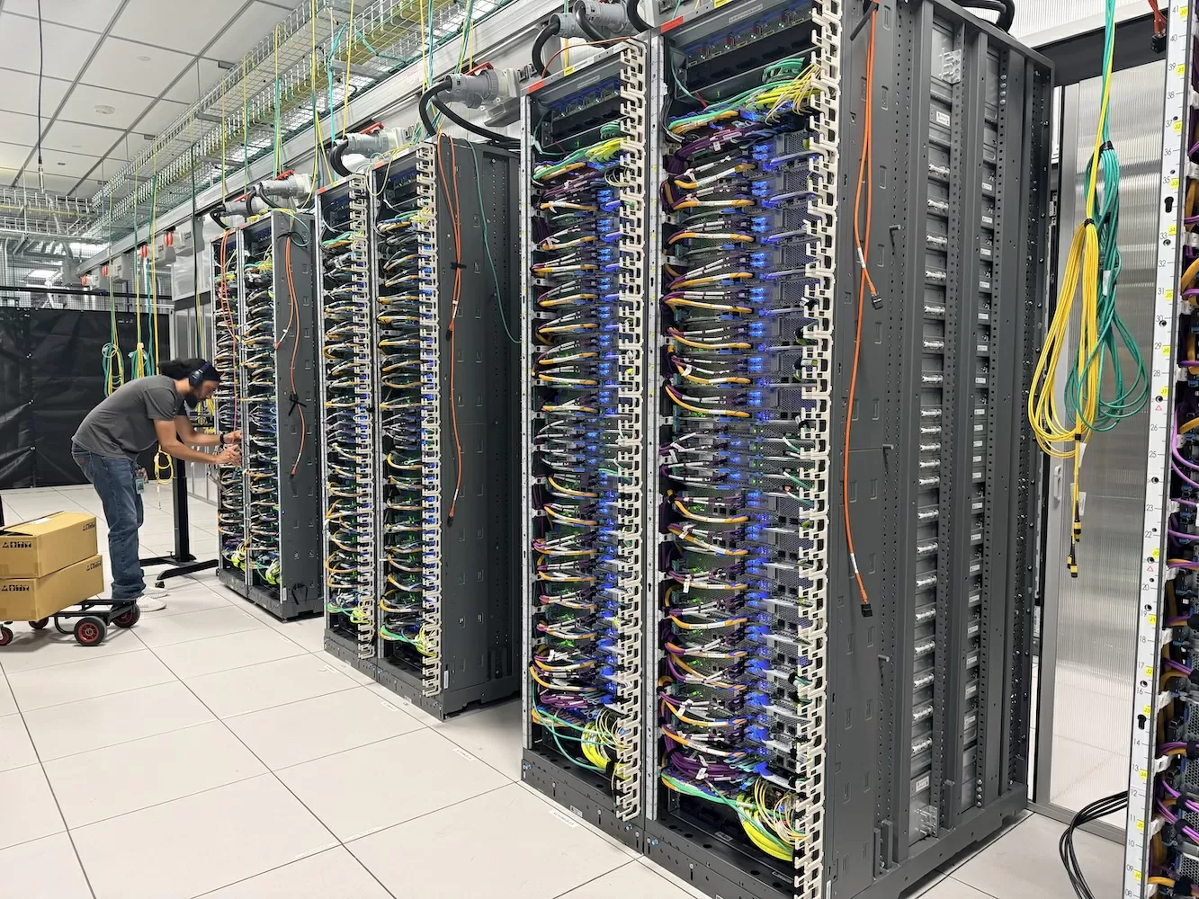 An exclusive tour of Amazon’s Trainium lab, the chip that’s won over Anthropic, OpenAI, even Apple 