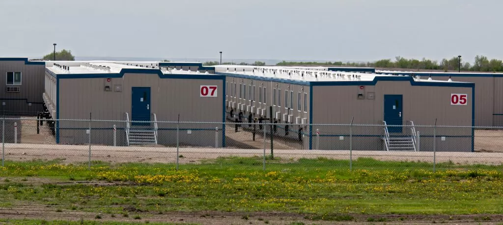 Owner of ICE detention facility sees big opportunity in AI man camps